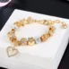 gold charm bracelet bds