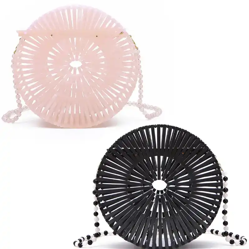 pink and black round purse bds