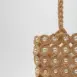 straw tote bag with pearls bds close view