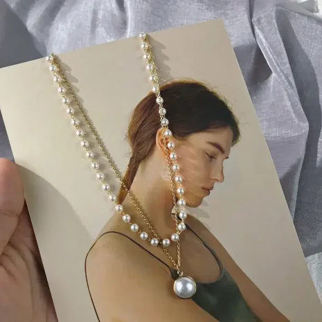 similar pearl layered necklaces