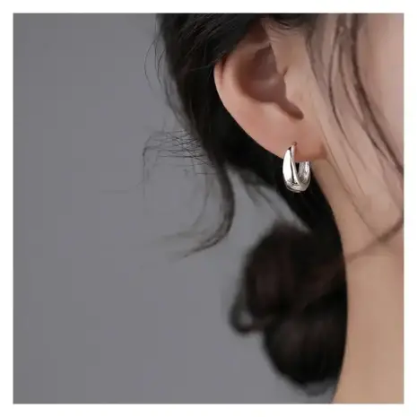 silver hoops earrings model display