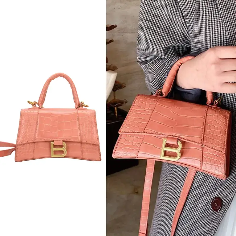 pink top handle bag model display