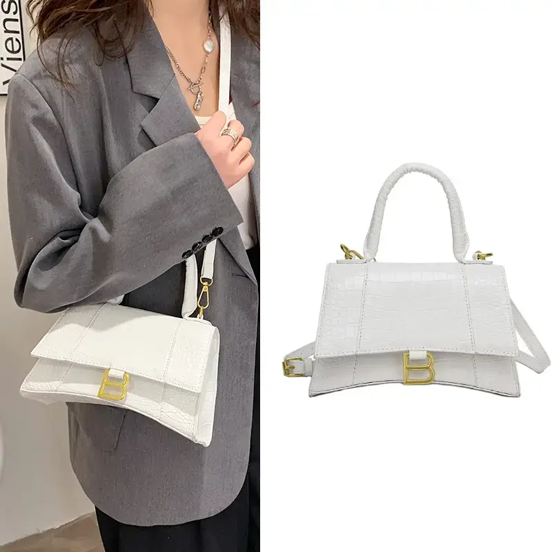 white top handle bag model display