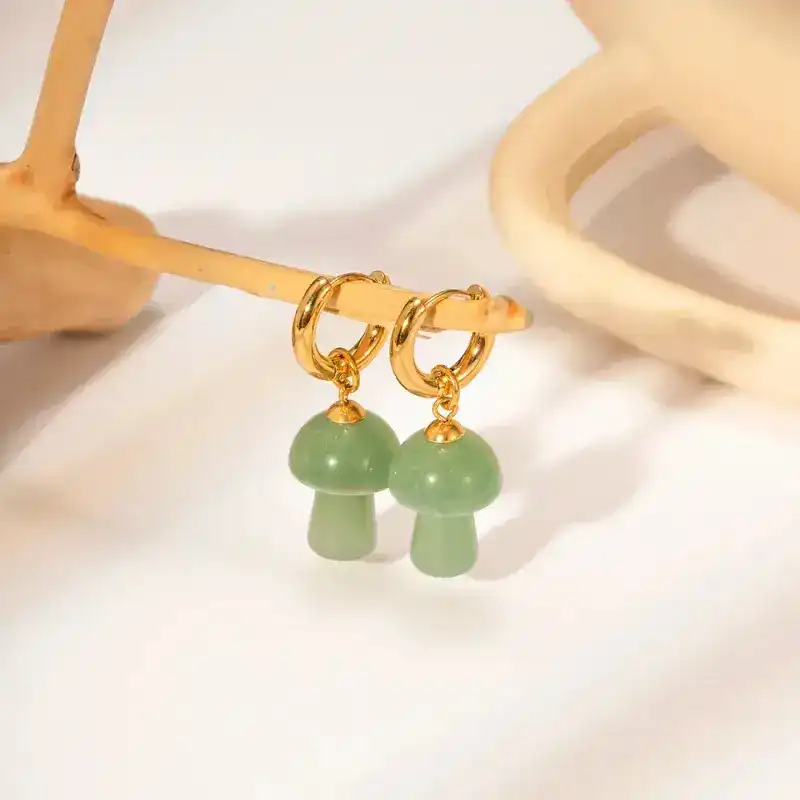 green mushroom earrings display bds