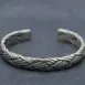 silver cuff bracelet with woven pattern