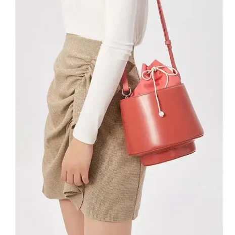 red bucket bag model