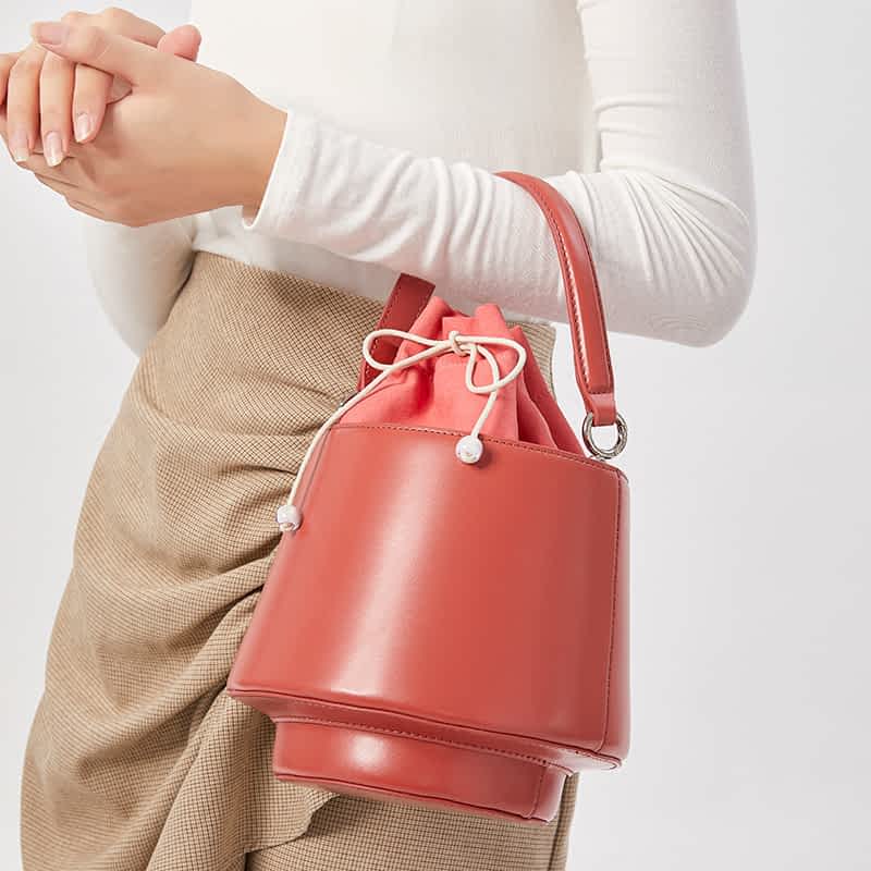 red bucket bag purse model display bds