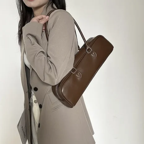 brown cylinder bag model display