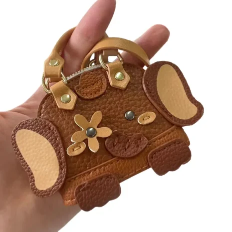 brown small coin purse with zipper model display