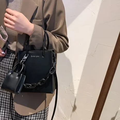tote bag with mini bag charm model